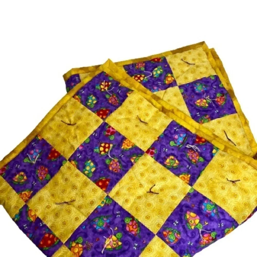 Handmade NWT turtle themed purple and gold baby or lap quilt size 43” X 38”